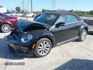2015 Volkswagen Beetle with VIN 3VW5A7AT7FM811978, listed as a IAAI auction lot 41983986 with 84,421 mi miles and . Bid and sale history available at DreamBid. Image 17.
