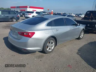 2019 Chevrolet Malibu LS with VIN 1G1ZB5STXKF147683, listed as a IAAI auction lot 42123608 with 104,692 mi miles and . Bid and sale history available at DreamBid. Image 4.