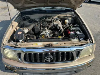 2002 Toyota Tacoma z VIN 5TEPM62N42Z897969, wystawiony jako Copart lot #60794585 z przebiegiem 138 463 mil mil oraz Czysty tytuł • Clean title. Historia ofert i sprzedaży dostępna na DreamBid. Obrazek 6.