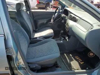 1998 Ford Escort LX with VIN 1FAFP10P1WW198981, listed as a Copart auction lot 60413215 with 82,113 mi miles and Salvage title. Bid and sale history available at DreamBid. Image 7.