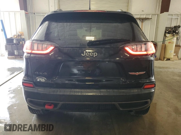 2019 Jeep Cherokee Trailhawk with VIN 1C4PJMBX1KD456551, listed as a Copart auction lot 58576065 with 121,259 mi miles and Salvage title. Bid and sale history available at DreamBid. Image 6.
