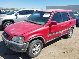 1999 Honda CR-V EX with VIN JHLRD1863XC005506, listed as a IAAI auction lot 42055660 with 240,048 mi miles. Bid and sale history available at carsss.com. Image 2.