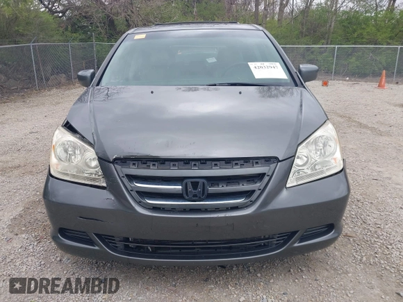 2007 Honda Odyssey EX-L with VIN 5FNRL38767B406636, listed as a IAAI auction lot 42032947 with 228,139 mi miles and . Bid and sale history available at carsss.com. Image 12.