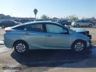 2016 Toyota Prius Four with VIN JTDKARFU6G3023120, listed as a IAAI auction lot 41641228 with 117,334 mi miles. Bid and sale history available at carsss.com. Image 12.
