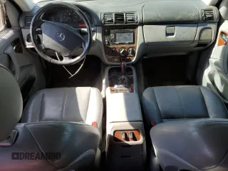 2000 Mercedes-Benz M 320/430/500 with VIN 4JGAB72E3YA172993, listed as a Copart auction lot 47051815 with 112,355 mi miles and Salvage title. Bid and sale history available at DreamBid. Image 8.