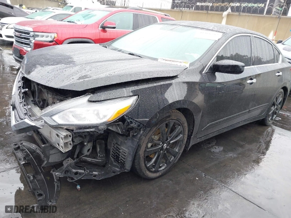 2018 Nissan Altima 2.5 SL with VIN 1N4AL3AP4JC288183, listed as a IAAI auction lot 41466582 with 100,858 mi miles. Bid and sale history available at carsss.com. Image 2.