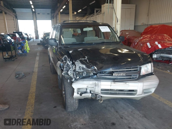 2001 Isuzu Trooper S with VIN JACDJ58X917J09299, listed as a IAAI auction lot 41296724 with 131,829 mi miles and . Bid and sale history available at DreamBid. Image 1.