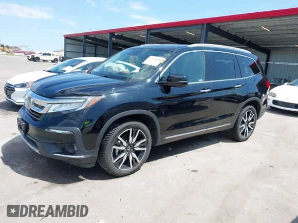 2019 Honda Pilot Touring 7-Passenger with VIN 5FNYF6H67KB031988, listed as a IAAI auction lot 42519588 with 41,368 mi miles and . Bid and sale history available at DreamBid. Image 22.