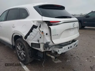 2019 Mazda CX-9 Touring with VIN JM3TCACY2K0328347, listed as a IAAI auction lot 41917854 with 67,173 mi miles and . Bid and sale history available at DreamBid. Image 17.
