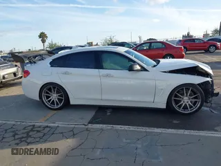 2018 BMW 4 Series 430i with VIN WBA4J1C59JBG77470, listed as a IAAI auction lot 41534689 with 141,710 mi miles and . Bid and sale history available at carsss.com. Image 13.