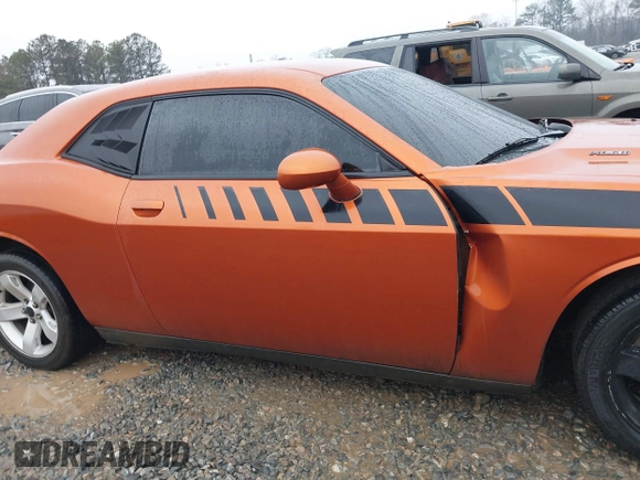 2011 Dodge Challenger z VIN 2B3CJ4DG5BH605530, wystawiony jako IAAI lot #41437632 z przebiegiem 139 992 mil mil oraz . Historia ofert i sprzedaży dostępna na DreamBid. Obrazek 13.