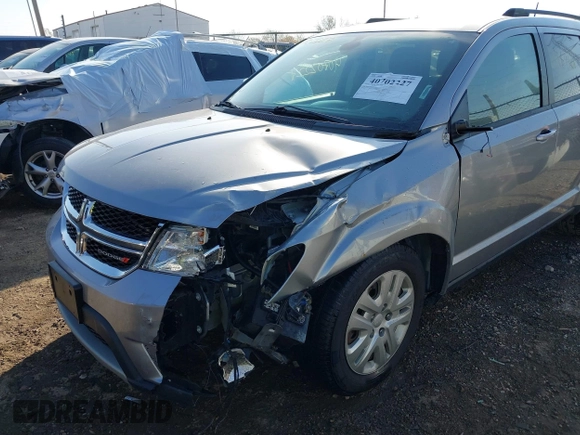 2019 Dodge Journey SE with VIN 3C4PDCBB6KT835643, listed as a IAAI auction lot 40702227 with 99,691 mi miles and . Bid and sale history available at DreamBid. Image 6.