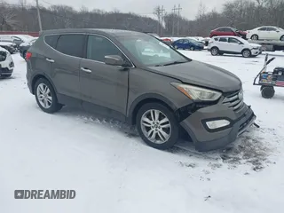 2013 Hyundai Santa Fe Sport z VIN 5XYZWDLA1DG053730, wystawiony jako IAAI lot #41260880 z przebiegiem 96 004 mil mil oraz . Historia ofert i sprzedaży dostępna na DreamBid. Obrazek 1.