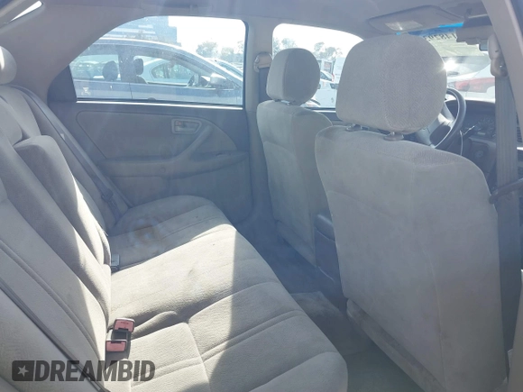 2001 Toyota Camry CE z VIN 4T1BG22K51U083381, wystawiony jako IAAI lot #41482936 z przebiegiem 84 219 mil mil oraz . Historia ofert i sprzedaży dostępna na DreamBid. Obrazek 8.