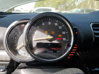 2016 MINI Clubman z VIN WMWLN5C50G2E29737, wystawiony jako Copart lot #50459135 z przebiegiem 129 940 mil mil oraz Szkody całkowita. Historia ofert i sprzedaży dostępna na DreamBid. Obrazek 9.