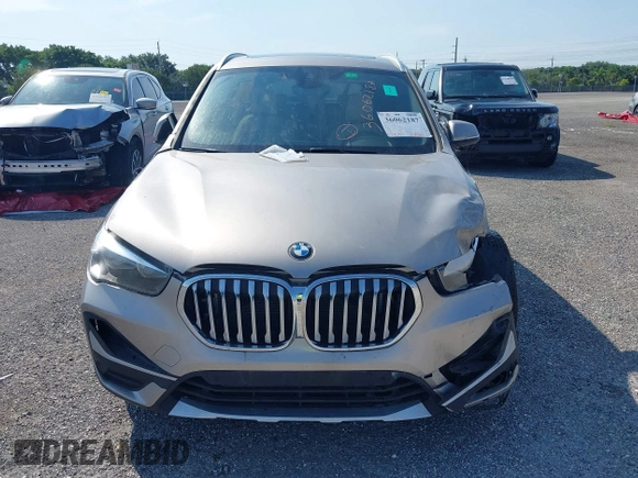 2021 BMW X1 sDrive28i z VIN WBXJG7C09M5U26043, wystawiony jako IAAI lot #36062187 z przebiegiem 14 844 mil mil oraz . Historia ofert i sprzedaży dostępna na DreamBid. Obrazek 12.
