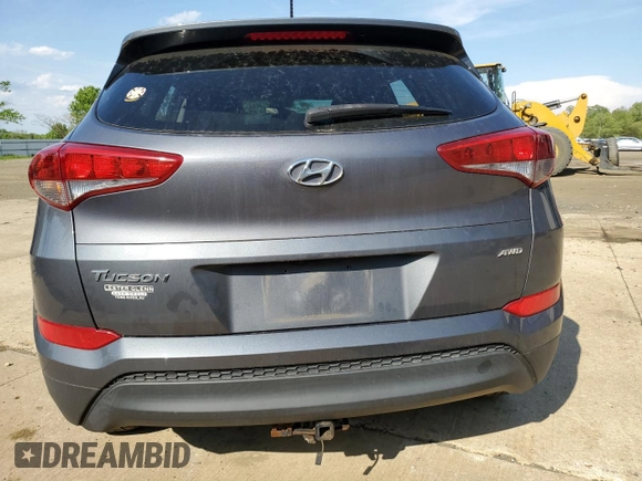2018 Hyundai Tucson SE z VIN KM8J2CA44JU645919, wystawiony jako Copart lot #55580635 z przebiegiem Nie podano mil oraz Szkody całkowita. Historia ofert i sprzedaży dostępna na DreamBid. Obrazek 6.