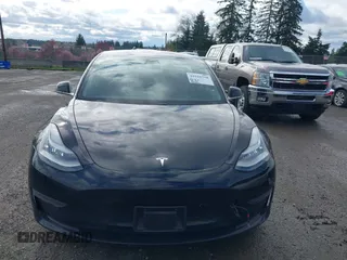 2019 Tesla Model 3 Mid Range with VIN 5YJ3E1EA4KF305611, listed as a IAAI auction lot 41916738 with 59,101 mi miles and . Bid and sale history available at carsss.com. Image 12.