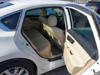 2014 Nissan Altima S with VIN 1N4AL3AP9EC187369, listed as a IAAI auction lot 42101760 with 173,899 mi miles and . Bid and sale history available at DreamBid. Image 8.
