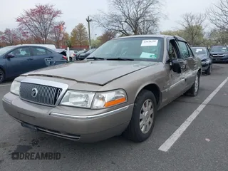 2003 Mercury Grand Marquis LS Premium z VIN 2MEFM75W73X653224, wystawiony jako IAAI lot #42038256 z przebiegiem 145 374 mil mil oraz . Historia ofert i sprzedaży dostępna na DreamBid. Obrazek 6.