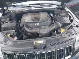 2015 Jeep Grand Cherokee Altitude with VIN 1C4RJEAGXFC856684, listed as a IAAI auction lot 41670546 with 182,588 mi miles. Bid and sale history available at carsss.com. Image 10.