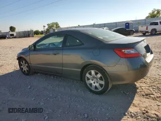 2010 Honda Civic Cpe LX with VIN 2HGFG1B67AH527237, listed as a Copart auction lot 71032914 with 184,842 mi miles and Salvage Title. Bid and sale history available at carsss.com. Image 2.