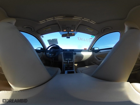 2012 Volkswagen Passat SE w/Sunroof with VIN 1VWBH7A35CC077207, listed as a IAAI auction lot 41351317 with 136,904 mi miles. Bid and sale history available at carsss.com. Image 19.