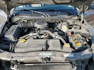 2001 Dodge Durango z VIN 1B4HS28Z71F516203, wystawiony jako Copart lot #75471444 z przebiegiem 226 560 mil mil oraz Czysty tytuł • Clean title. Historia ofert i sprzedaży dostępna na DreamBid. Obrazek 12.