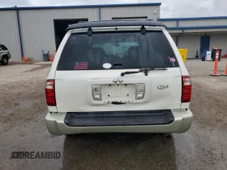 2003 Infiniti QX4 with VIN JNRDR09X83W251941, listed as a Copart auction lot 71044774 with 162,214 mi miles and Salvage Title. Bid and sale history available at DreamBid. Image 6.
