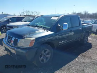 2005 Nissan Titan XE with VIN 1N6AA07A65N512479, listed as a IAAI auction lot 41659482 with 225,037 mi miles and . Bid and sale history available at DreamBid. Image 6.