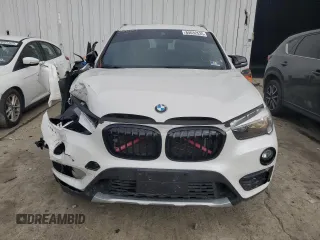2019 BMW X1 xDrive28i with VIN WBXHT3C52K3H34021, listed as a Copart auction lot 64032535 with 30,752 mi miles and Salvage title. Bid and sale history available at DreamBid. Image 5.
