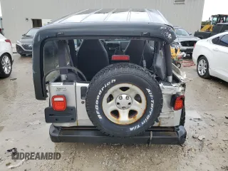 2002 Jeep Wrangler Sport with VIN 1J4FA49S32P733909, listed as a Copart auction lot 72776204 with 157,508 mi miles and Non Repairable. Bid and sale history available at carsss.com. Image 6.