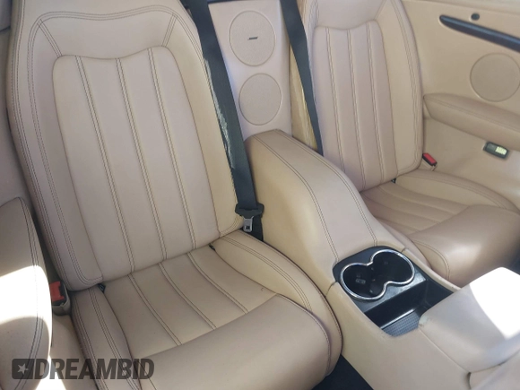 2013 Maserati GranTurismo Convertible Sport with VIN ZAM45MMA2D0069786, listed as a IAAI auction lot 40874830 with 37,312 mi miles. Bid and sale history available at carsss.com. Image 8.