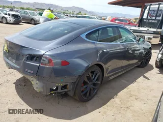 2018 Tesla Model S 75D with VIN 5YJSA1E43JF260547, listed as a IAAI auction lot 42346240 with 89,637 mi miles and . Bid and sale history available at DreamBid. Image 4.