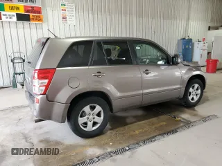 2013 Suzuki Grand Vitara Premium z VIN JS3TE0D60D4100323, wystawiony jako Copart lot #59333335 z przebiegiem 102 368 mil mil oraz Szkoda całkowita • Salvage title. Historia ofert i sprzedaży dostępna na DreamBid. Obrazek 3.