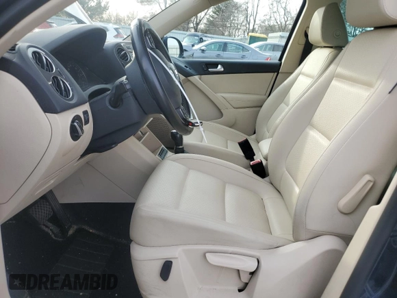2013 Volkswagen Tiguan S with VIN WVGBV3AX0DW066778, listed as a Copart auction lot 85110984 with 108,027 mi miles and Salvage title. Bid and sale history available at DreamBid. Image 7.