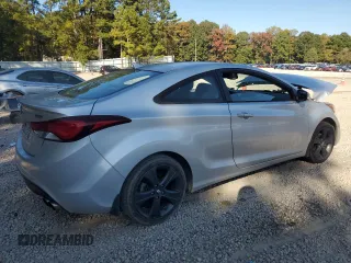 2014 Hyundai Elantra Coupe with VIN KMHDH6AH4EU026680, listed as a Copart auction lot 77350814 with 104,828 mi miles and Salvage Title. Bid and sale history available at carsss.com. Image 3.
