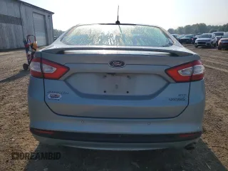 2013 Ford Fusion SE Hybrid z VIN 3FA6P0LU3DR353512, wystawiony jako Copart lot #63551325 z przebiegiem Nie podano mil oraz Czysty tytuł • Clean title. Historia ofert i sprzedaży dostępna na DreamBid. Obrazek 6.