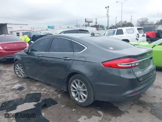 2017 Ford Fusion Energi SE with VIN 3FA6P0PU4HR306053, listed as a IAAI auction lot 41294944 with 88,603 mi miles. Bid and sale history available at carsss.com. Image 3.