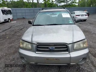 2005 Subaru Forester XS with VIN JF1SG65605H745494, listed as a IAAI auction lot 42382364 with 256,505 mi miles and . Bid and sale history available at DreamBid. Image 12.