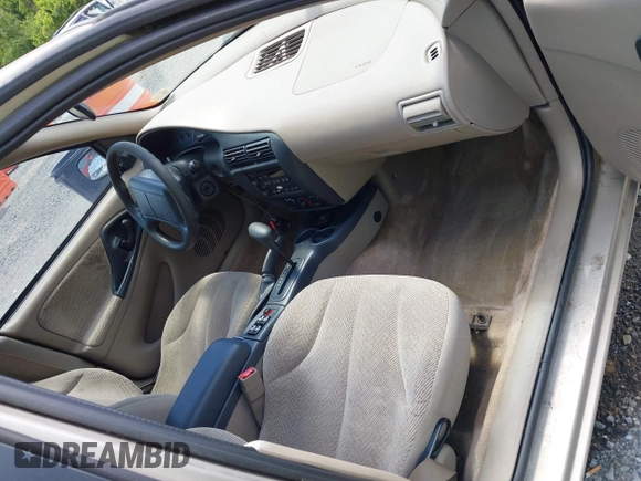 2002 Chevrolet Cavalier LS z VIN 1G1JF524227166216, wystawiony jako IAAI lot #42329962 z przebiegiem 155 966 mil mil oraz . Historia ofert i sprzedaży dostępna na DreamBid. Obrazek 5.