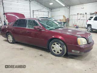 2002 Cadillac DeVille with VIN 1G6KD54Y12U214732, listed as a IAAI auction lot 42018412 with 139,474 mi miles. Bid and sale history available at carsss.com. Image 1.