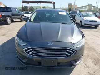 2017 Ford Fusion S with VIN 3FA6P0G72HR190331, listed as a IAAI auction lot 42003479 with 130,252 mi miles. Bid and sale history available at carsss.com. Image 12.
