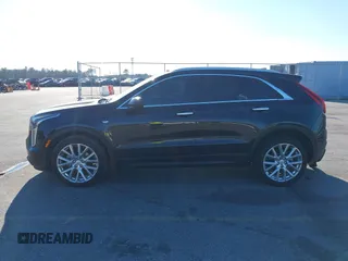 2021 Cadillac XT4 FWD Luxury with VIN 1GYAZAR46MF074767, listed as a IAAI auction lot 41652091 with 46,631 mi miles and . Bid and sale history available at DreamBid. Image 14.