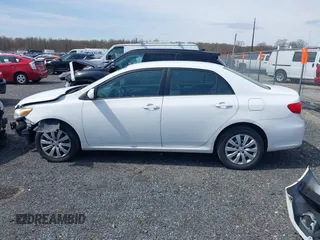 2012 Toyota Corolla L with VIN 2T1BU4EE5CC866490, listed as a IAAI auction lot 41941161 with 99,901 mi miles. Bid and sale history available at carsss.com. Image 15.