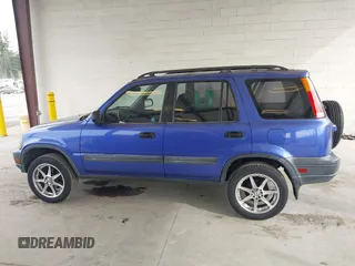 2001 Honda CR-V LX with VIN JHLRD28451C005857, listed as a IAAI auction lot 42004556 with 211,403 mi miles. Bid and sale history available at carsss.com. Image 14.