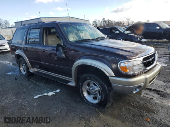 2000 Ford Explorer Eddie Bauer z VIN 1FMZU74E6YUB37521, wystawiony jako Copart lot #85994294 z przebiegiem 126 348 mil mil oraz Szkoda całkowita • Salvage title. Historia ofert i sprzedaży dostępna na DreamBid. Obrazek 4.