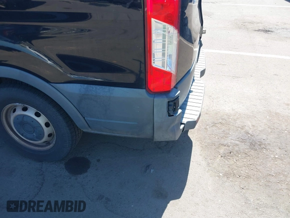 2016 Ford Transit Cargo with VIN 1FTYE1YM7GKB56682, listed as a IAAI auction lot 39506785 with 221,399 mi miles and . Bid and sale history available at DreamBid. Image 6.