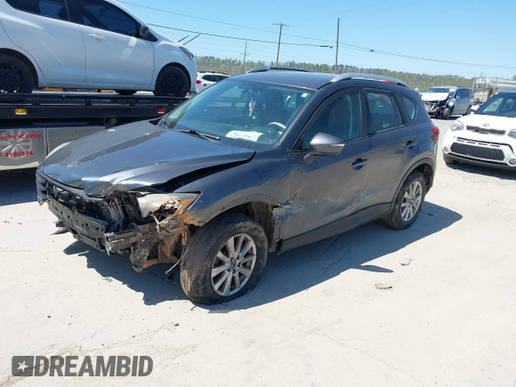 2016 Mazda CX-5 Sport with VIN JM3KE2BY2G0781565, listed as a IAAI auction lot 42042256 with 182,186 mi miles. Bid and sale history available at carsss.com. Image 2.