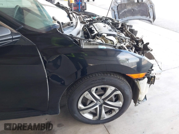 2018 Honda Civic LX with VIN 2HGFC2F53JH605760, listed as a IAAI auction lot 42032200 with 217,239 mi miles and . Bid and sale history available at DreamBid. Image 19.